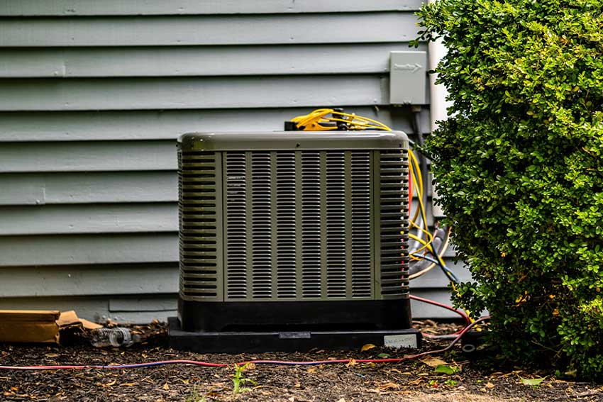 An a/c unit undergoing maintenance.
